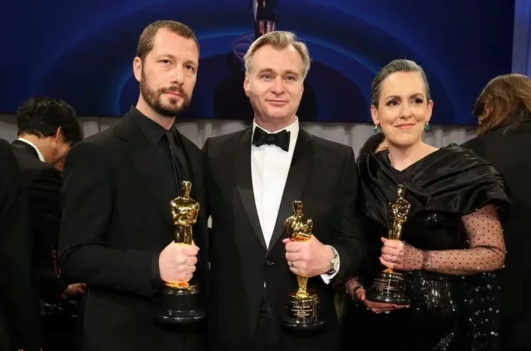 Крістофер Нолан з дружиною Еммою Томас та українським режисером Мстиславом Черновим