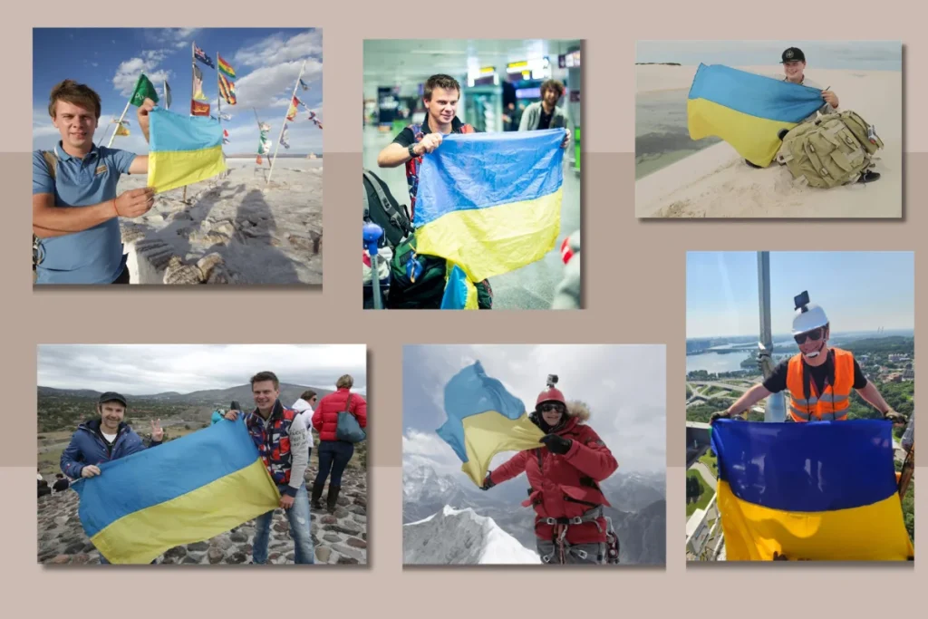 Дмитро Комаров із прапором України під час подорожей